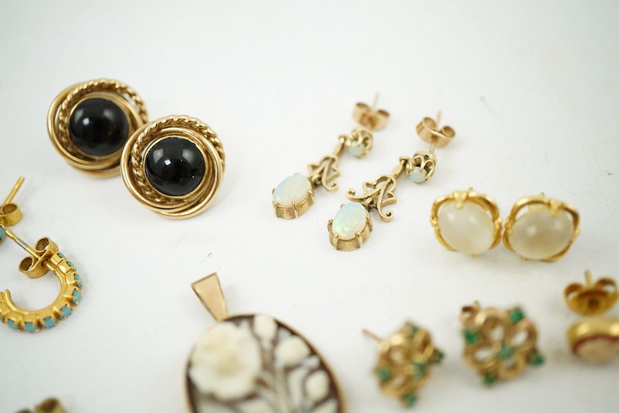 Eight pairs of earrings and pendant, comprising: a pair of onyx studs; a pair of emerald studs; a pair of sapphire and diamond drop earrings; a pair of opal drop earrings; a pair of garnet drop earrings; and a shell pend